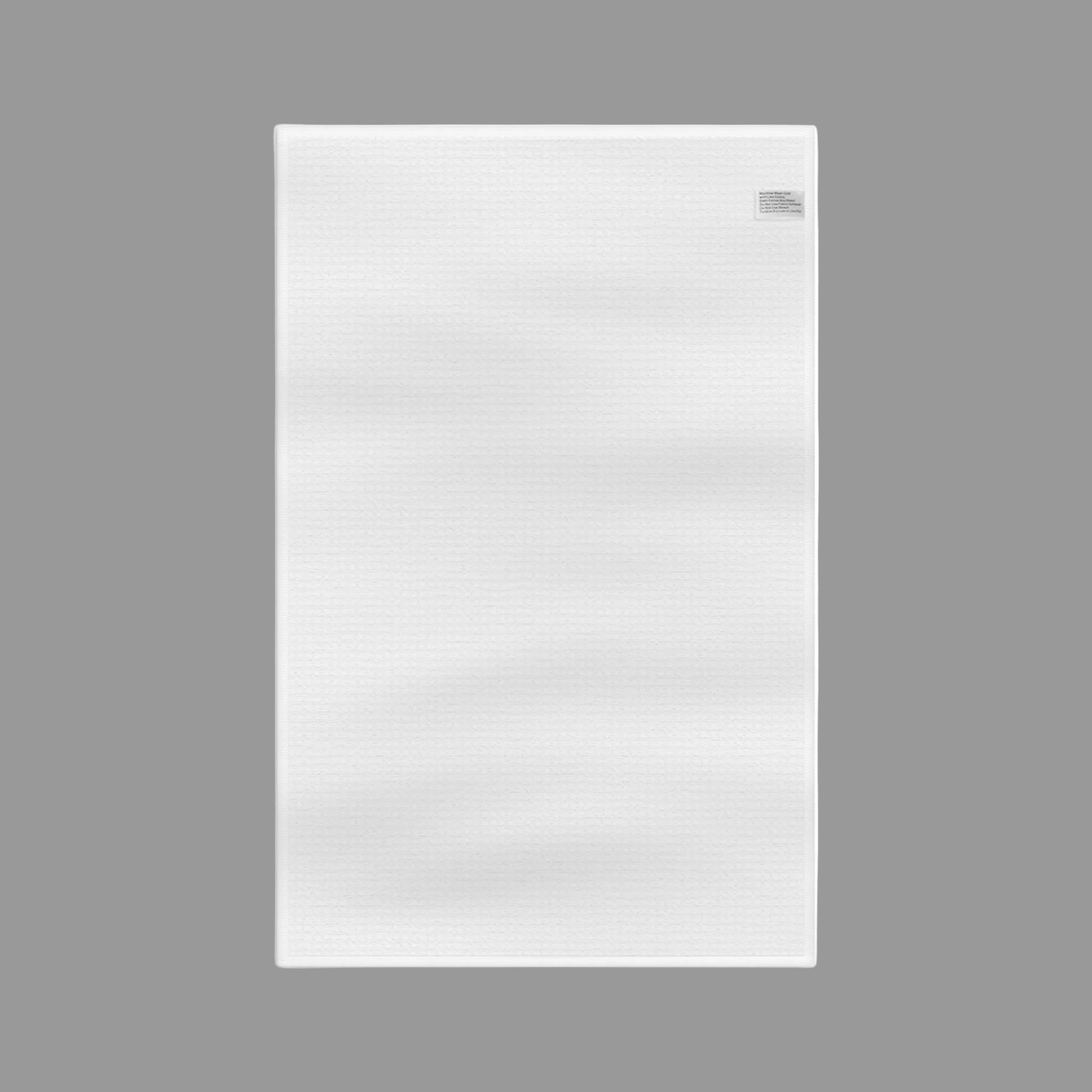 Back of white kitchen towel With a grey background 